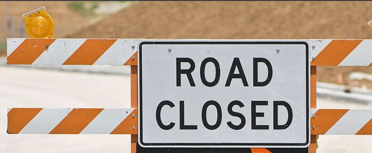 Temporary traffic control on Rawdat Bu Fuz Street, Qatar
