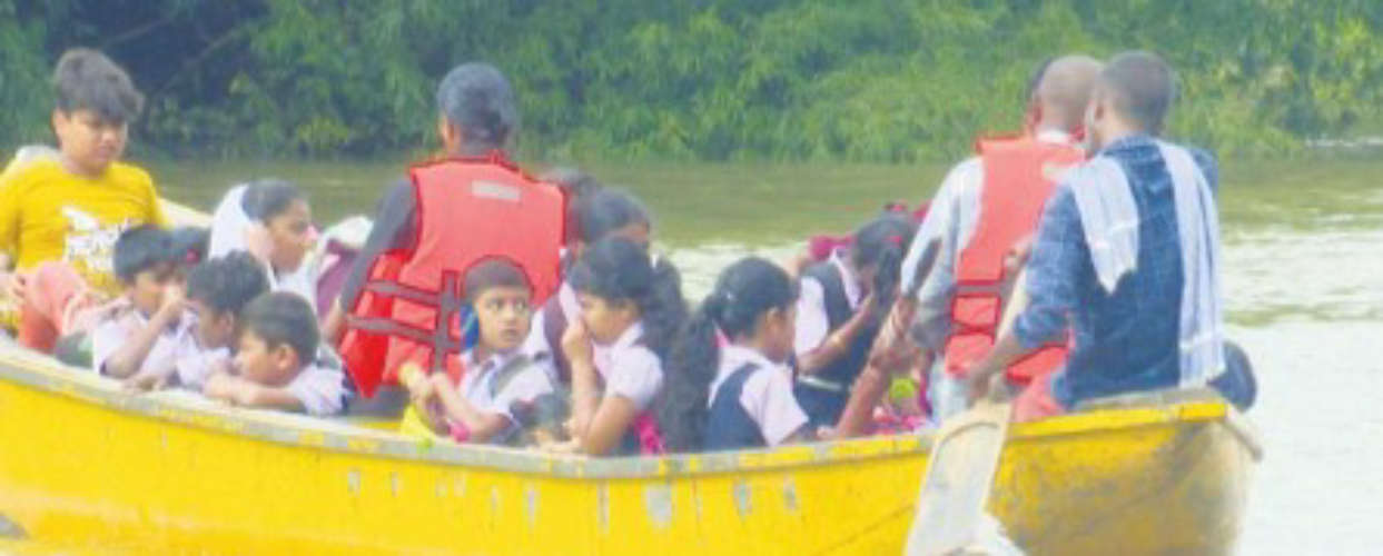 Students Brave Kabani River on Adventurous Journey to Perikkallur School